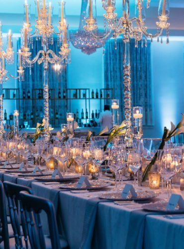 cuneo-mansion-and-gardens-masquerade-birthday-party-elegant-expensive-candelabra-decor-guest-table-candle-lights-floral-centerpieces-decoration-ideas